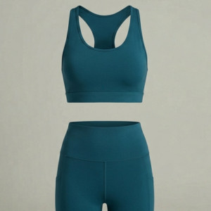 Matching deep teal high-impact sports bra and high-waisted leggings set.